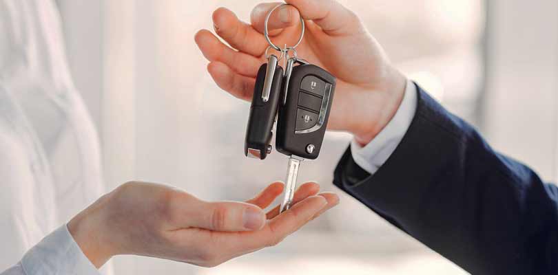 Handing over car keys from one person to another